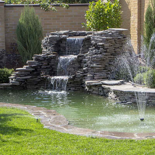 Outdoor fountain in backyard using solar water pump
